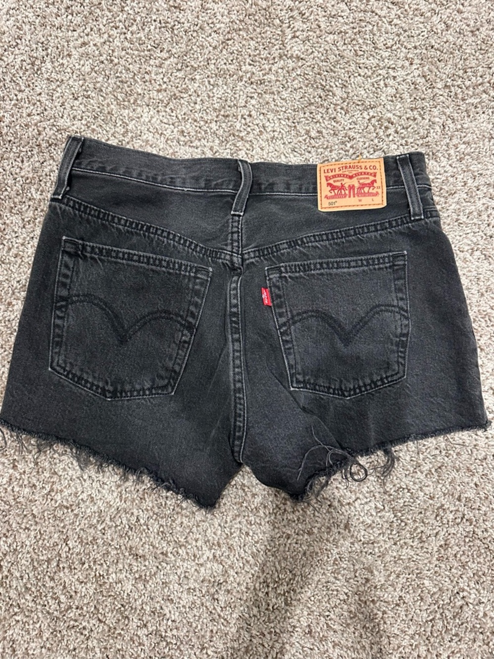 Classic Levi’s 501-style black denim cutoff shorts
